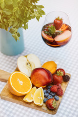 Top view of summer dinks, fruit cocktails on white wood table wi