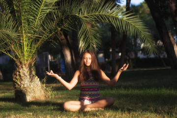 girl meditates and palm