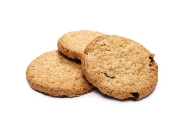 Round wholewheat biscuits with raisins isolated on white background
