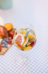 Top view of summer dinks, fruit cocktails on white wood table wi