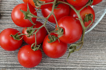 Vine tomatoes and knife on black back ground,

