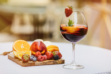 Top view of summer dinks, fruit cocktails on white wood table wi
