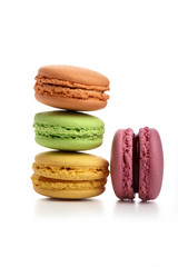 Pyramid of three macaroons and pink one nearby