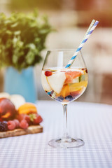 Top view of summer dinks, fruit cocktails on white wood table wi