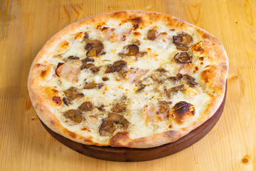 Pizza with mushrooms and ham