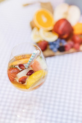 Top view of summer dinks, fruit cocktails on white wood table wi