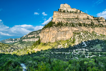WYOMING PEAK OVER HIGHWAY AND RIVER