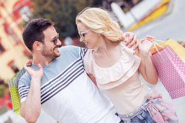 Naklejka premium Loving couple shopping