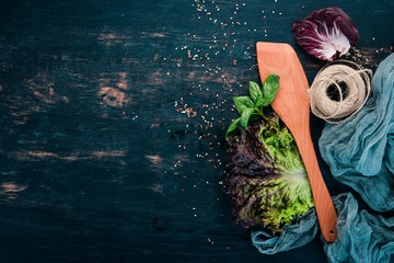 Food cooking background. On a wooden background. Top view. Copy space.