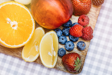 Top view of summer dinks, fruit cocktails on white wood table wi