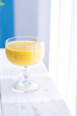 Fresh banana juice, a sunny morning. Healthy breakfast. Copy space