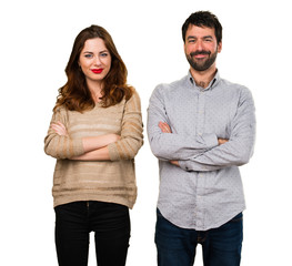 Young couple with their arms crossed