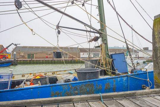 Fishing boat moored along a jetty in the port of Vlissingen 