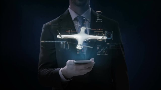Businessman touching smart phone, Rotating Drone, Quadrocopter, with futuristic user interface, Virtual graphic. 4k movie. blue x-ray image.