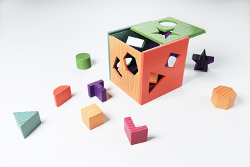 3D Rendering of a wooden sorting cube baby toy