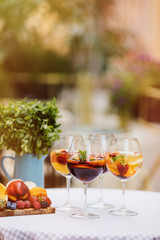 Top view of summer dinks, fruit cocktails on white wood table wi