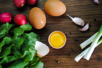 Raw egg and vegetables