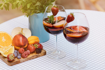 Top view of summer dinks, fruit cocktails on white wood table wi