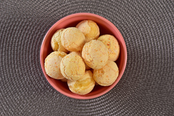 Cheese breads on gray texture background