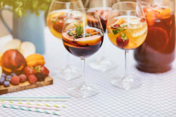 Top view of summer dinks, fruit cocktails on white wood table wi