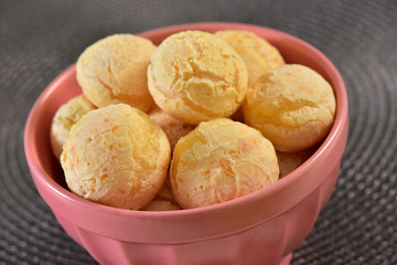 Cheese breads on gray texture background