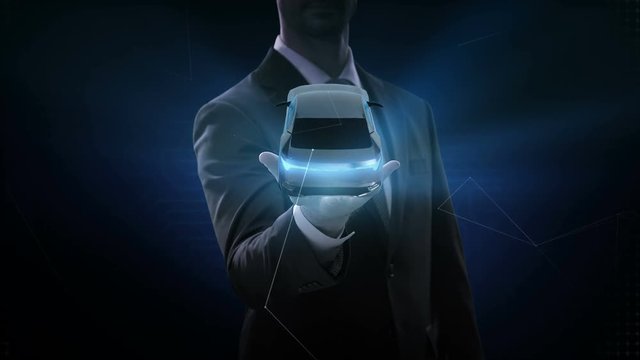 Businessman opens palm, Rotating Electronic, hybrid, lithium ion battery echo car. eco-friendly future car. 4k movie.