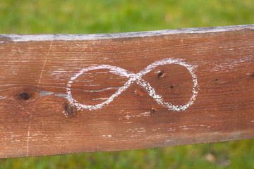 Infinity sign on a board