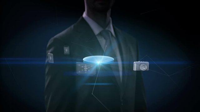Businessman touching Devices, connecting digital Brain, artificial intelligence. Internet of things. 4k movie.