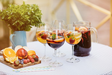 Top view of summer dinks, fruit cocktails on white wood table wi