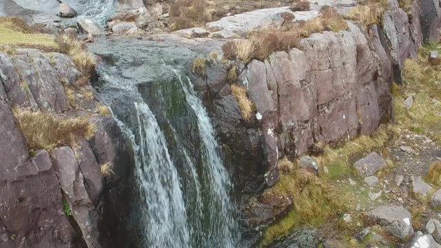 Waterfall at Conner Pass on Dingle Peninsula - aerial flight footage