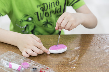 Handmade - little boy painting stone . activity for children