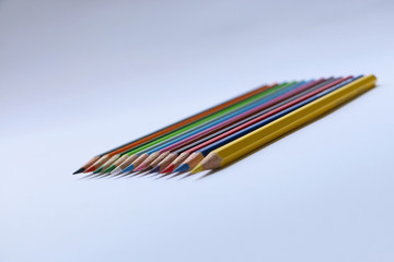 Close up of multi colored pencils in a row
