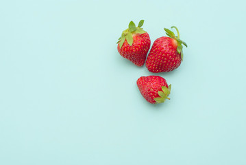 fresh strawberry on a blue background