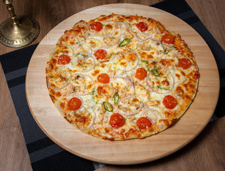 Pizza with ketchup and tuna