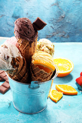 Set of ice cream scoops of different colors and flavours