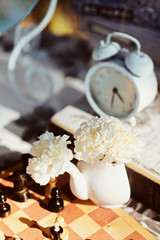 Holiday themed table for the tea ceremony. Table with sweets. Tea with sweets. Table of Alice in Wonderland