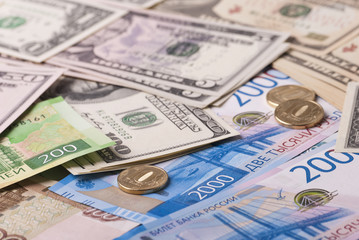 Fototapeta na wymiar Dollar, ruble banknotes, coins