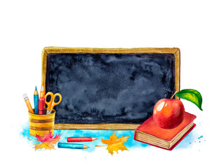 Blackboard with school supplies