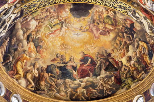 PARMA, ITALY - APRIL 16, 2018: The fresco of Coronation of Virgin Mary in main apse of church Chiesa di Santa Mari della Steccata by Michelangelo Anselmi (1541).