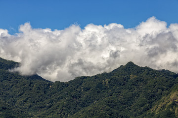 Clouds gather over mountains near the Bena traditional village in Flores, Indonesia.