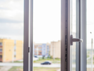 close up white plastic window at home