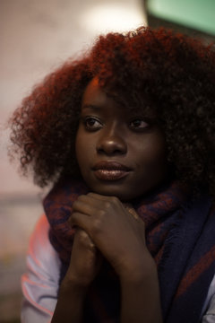 Woman, black, dark, dark skin, portrait, natural hair, sitting, indoor, African