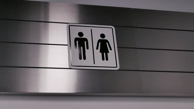 Motion of man and woman washroom logo on wall with 4k resolution