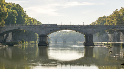 Fototapeta premium View of a bridge down the River Tiber in Rome, Italy