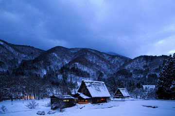 Gassho zukuri thatched roof house in the snow at Shirakawago, Japan