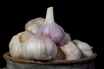 Garlic in a clay pot