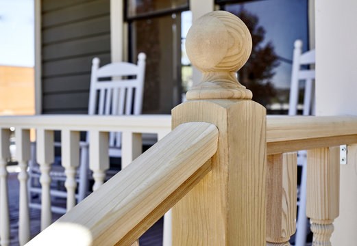 Wooden Rocking Chairs on Front Porch