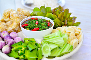 Shrimp paste chili sauce in Thai cal Nam Prik Kapi with fresh vegetables the old style popular traditional delicious Thai food.