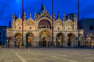 Saint Mark's square with Saint Mark's Basilica at sunrise in Venice Italy
