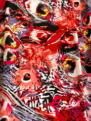 Fabric with painted red feathers